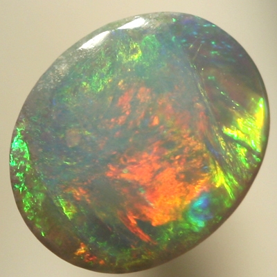 SOLID SEMI BLACK OPAL Central orange colour patch surrounded by green, all bright